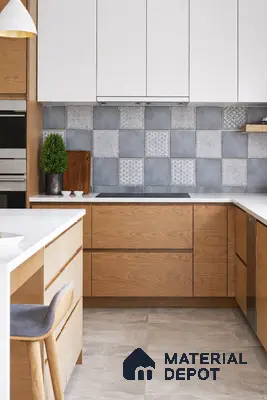 Scandinavian kitchen with oak wood laminate, white quartz countertop, and patterned grey backsplash tiles