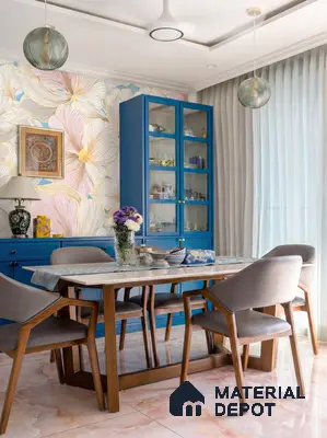 Eclectic dining room with floral wallpaper, blue cabinetry, and marble-look floor tiles