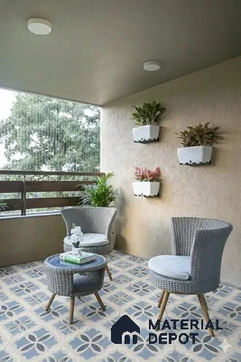 Scandinavian balcony with blue and beige floral patterned floor tiles and wicker furniture of 3 BHK apartment in Prestige North Point Kalyan Nagar in Bengaluru