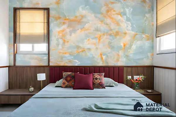 Modern bedroom with abstract marble wallpaper, burgundy upholstered headboard, and wooden fluted wall panels