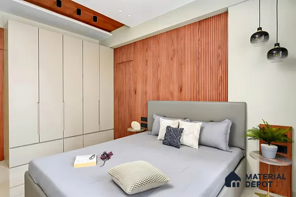 Minimalist bedroom with beige laminate wardrobe and vertical wood fluted wall panels of 3 BHK apartment in Pristine Meadows Jakkur Bengaluru
