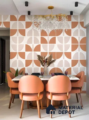 Modern dining room with geometric terracotta wallpaper and peach upholstered chairs