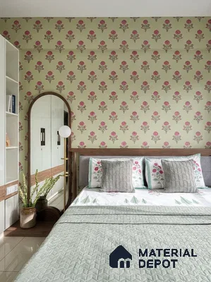 Eclectic bedroom with floral patterned wallpaper and pastel green bedding
