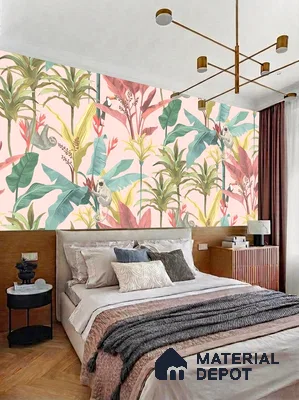 Eclectic bedroom with tropical wallpaper, light wood paneling, and neutral upholstered bed