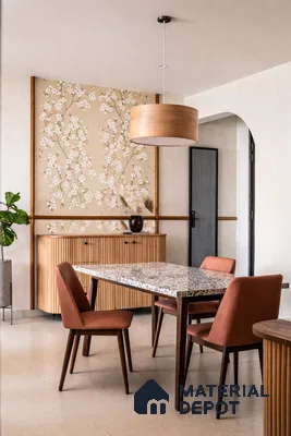 Modern dining room with terrazzo tabletop, floral wallpaper, and fluted wood sideboard