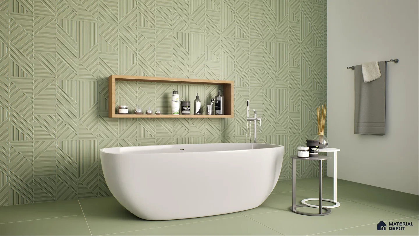 Modern bathroom featuring a white bathtub against a backdrop of geometric green tiles, wooden shelf, and stylish decor. | Material Depot