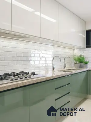 Modern kitchen with sage green and white high gloss laminate, marble countertop, and white subway backsplash tile