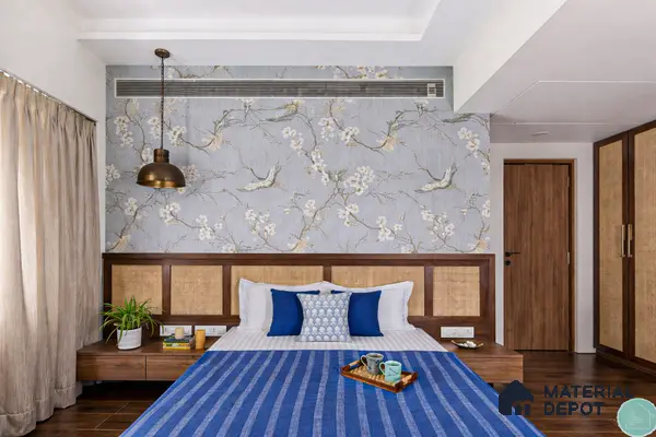 Japandi bedroom with floral chinoiserie wallpaper, cane panel headboard, and walnut wood wardrobe