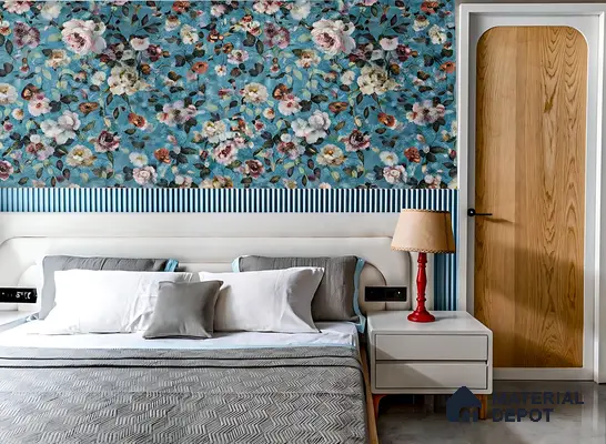 Eclectic bedroom with blue floral wallpaper, fluted blue wall panel, and natural wood door