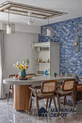 Eclectic dining room with blue patterned wallpaper, marble floor, and wood-cane dining chairs
