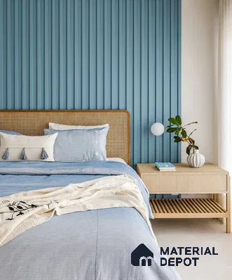 Scandinavian bedroom with blue fluted wall panels and natural cane headboard of 3 BHK apartment in Ramky One North Avalahalli Bengaluru
