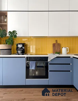 Modern kitchen with pastel blue laminate, white laminate, and yellow subway backsplash tiles of 3 BHK apartment in Ramky One North Avalahalli Bengaluru