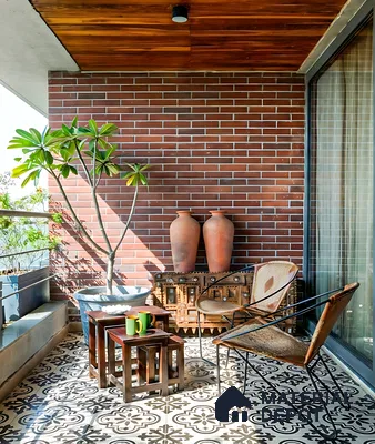 Eclectic balcony with brick cladding wall, patterned floor tiles, and wooden ceiling