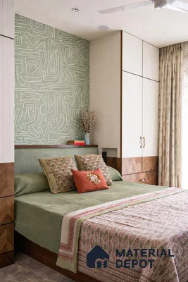 Scandinavian bedroom with sage green abstract wallpaper, ivory laminate wardrobe, and chevron wood laminate accents
