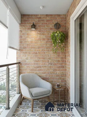 Modern balcony with exposed brick wall tiles and patterned ceramic floor tiles