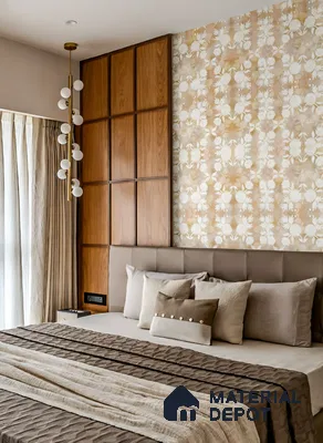 Modern bedroom with floral wallpaper, walnut wood panel, and taupe upholstered headboard in 3 BHK apartment SLV Parkview Apartment Bengaluru