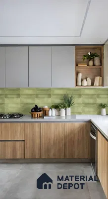 Modern kitchen with sage green geometric backsplash tile, light grey laminate, and natural wood laminate cabinets of 3 BHK apartment in SLV Suhas Celestia Jalahalli Bengaluru