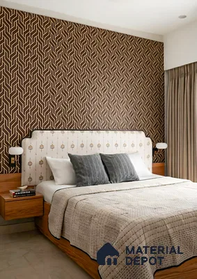 Modern bedroom with geometric patterned wallpaper and natural wood bed frame of 3 BHK apartment in SMR Vinay Endeavour Hoodi Bengaluru