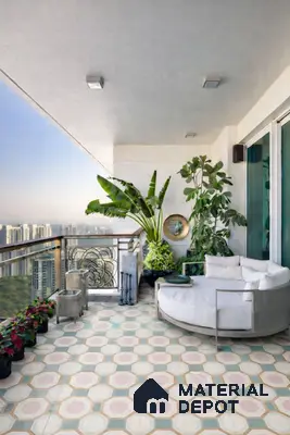 Modern balcony with pastel geometric floor tiles and white outdoor seating