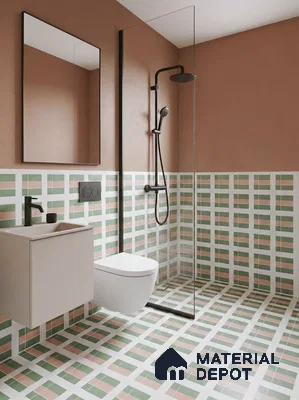 Modern bathroom with green and terracotta geometric wall and floor tiles