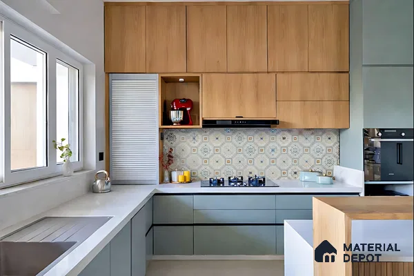 Scandinavian kitchen with light wood laminate, pastel blue laminate, and patterned moroccan backsplash tile