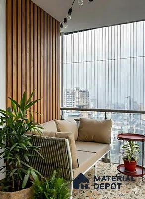 Modern balcony with oak wood vertical louvers and patterned floor tiles in Salarpuria Symphony Electronic City 3 BHK apartment Bengaluru