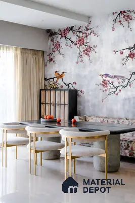 Art Deco dining room with chinoiserie floral wallpaper, marble floor, and gold-accented chairs