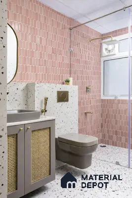 Modern bathroom with blush pink elongated hexagonal wall tiles and terrazzo floor and wall tiles