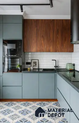 Modern kitchen with sage green laminate, walnut wood laminate, white subway backsplash tile, and blue patterned floor tile
