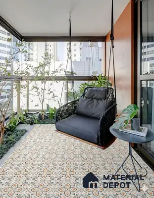 Modern balcony with patterned moroccan floor tiles and black woven swing chair of 3 BHK apartment in Sattva Celesta Salapuria in Bengaluru