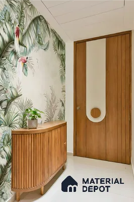 Modern foyer with tropical wallpaper, fluted wood console, and warm wood door in Sattva East Crest old madras road 2 BHK apartment Bengaluru