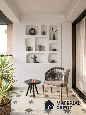 Minimalist balcony with star patterned floor tiles and built-in white plaster wall niches