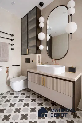 Modern bathroom with beige wall tiles, patterned geometric floor tiles, and fluted vanity laminate