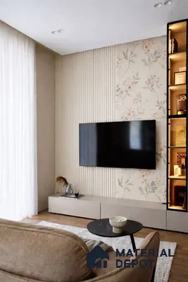 Scandinavian living room with fluted beige wall panels, floral wallpaper, and matte beige TV unit