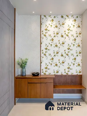 Modern foyer with floral wallpaper, white embossed wall panel, and walnut wood laminate console in 4 BHK apartment Siroya Environ Anand Nagar Bengaluru