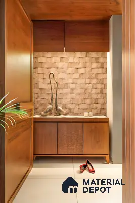 Modern foyer with natural stone cladding and walnut wood laminate cabinetry in 3 BHK apartment Skav Aastha Mahalakshmi layout Bengaluru