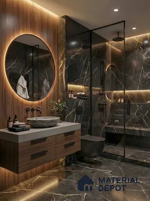Modern bathroom with black marble tiles, walnut wood laminate vanity, and backlit mirror