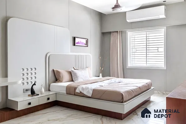 Minimalist bedroom with frosty white laminate bed, taupe upholstery, and marble floor tiles