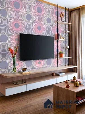 Modern living room with geometric patterned wallpaper, oak wood laminate TV unit, and wooden flooring