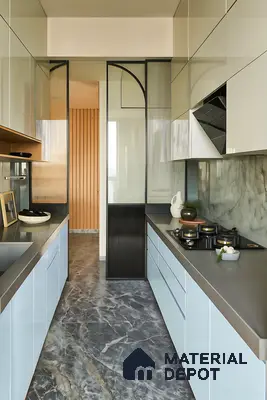 Modern parallel kitchen with glossy pastel blue laminate, grey quartz countertop, and marble-look floor tile of 4 BHK apartment in Sobha Althea and Azalea Whitefield in Bengaluru