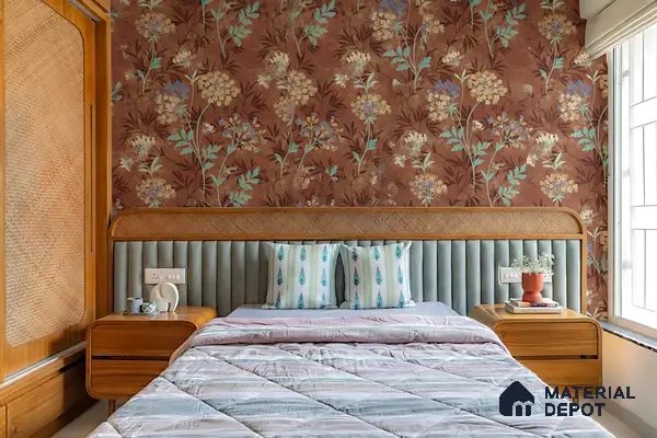 Mid-century modern bedroom with floral wallpaper, rattan wardrobe, and suede upholstered headboard of 3 BHK apartment in Sobha City Casa Paradiso  Bengaluru