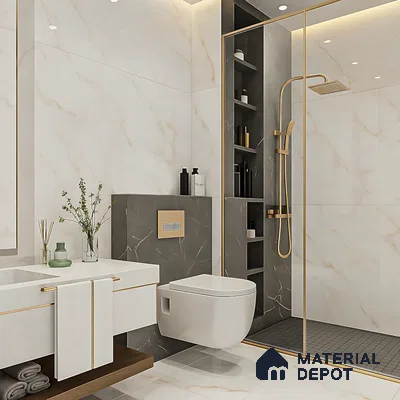 Modern bathroom with white marble-look wall tiles, dark marble accent tiles, and gold trim of 3 BHK apartment in Sobha Garrison Nagasandra in Bengaluru