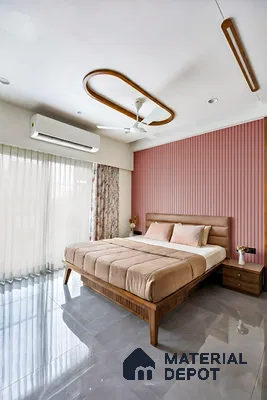 Modern bedroom with blush pink fluted wall panels, suede upholstered bed, and glossy grey marble floor tiles of 3 BHK apartment in Sobha Garrison Nagasandra in Bengaluru