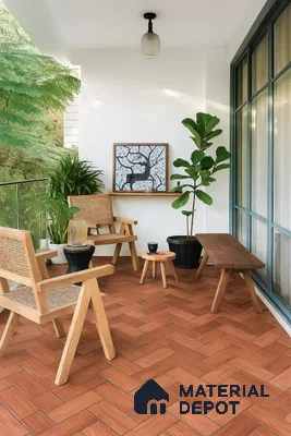 Scandinavian balcony with terracotta herringbone floor tiles and natural wood furniture of 2 BHK apartment in Sobha Rain Forest at Dream Acres Varthur in Bengaluru