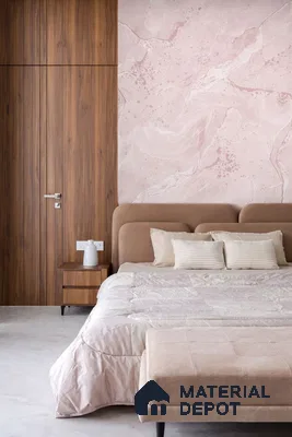 Minimalist bedroom with blush pink marble-look accent wall and walnut wood laminate wardrobe