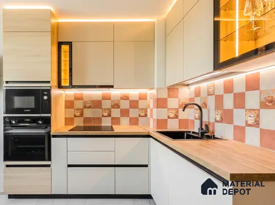 Modern kitchen with beige laminate cabinets, wood finish countertop, and terracotta checkerboard backsplash tiles