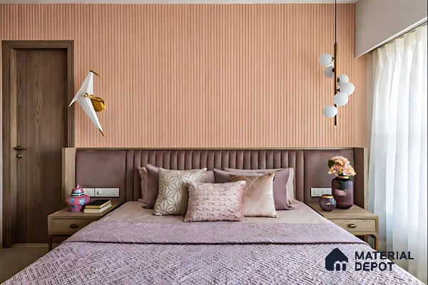 Modern bedroom with blush pink fluted wall panels and mauve suede upholstered headboard