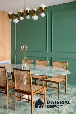 Mid-century modern dining room with green marble dining table, cane chairs, and green marble floor tile