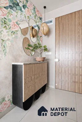 Eclectic foyer with floral wallpaper, patterned console, and wood finish main door