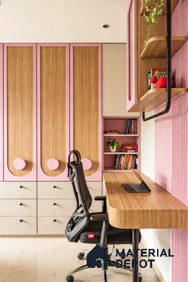 Modern study room with pastel pink and oak wood laminate, fluted wall panels, and built-in storage